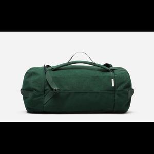 Green Everlane Mover Pack duffel backpack